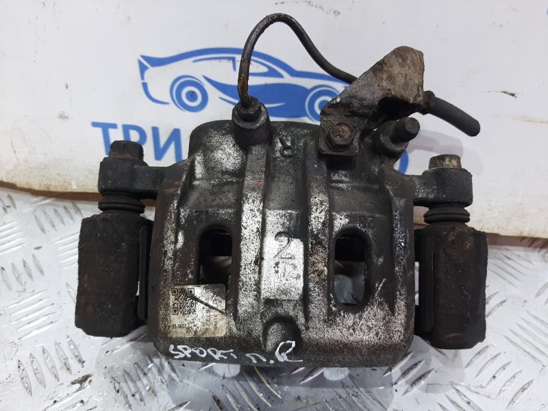 Суппорт передний правый Mitsubishi Pajero Sport K9 2.5 DIESEL 4D56 1996 (б/у) Киев - изображение 1