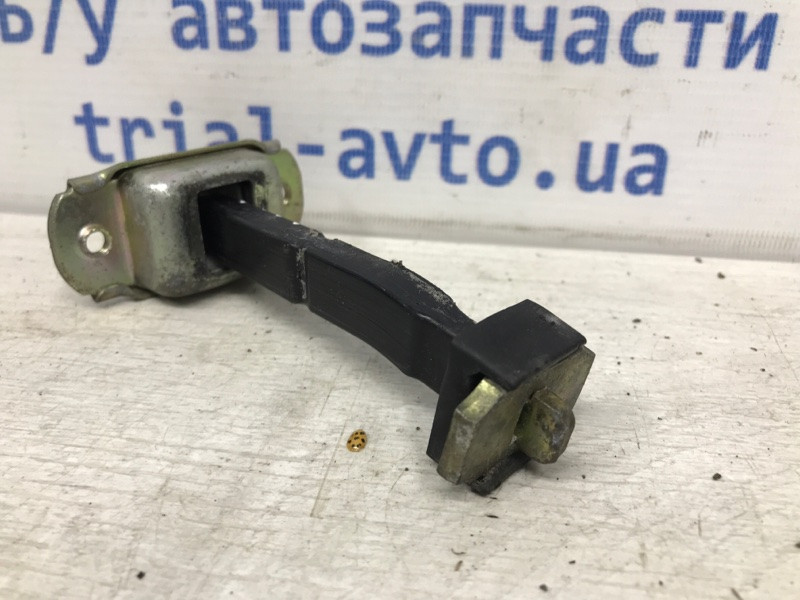 Ограничитель двери передний правый Mitsubishi Pajero Sport K9 2.5 DIESEL 4D56 1996 (б/у) Киев - изображение 3