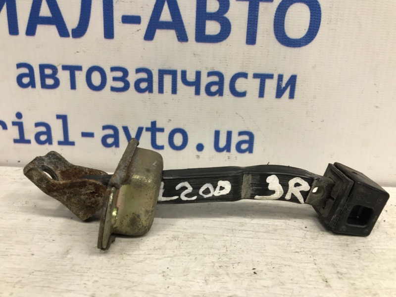 Ограничитель двери задний правый Mitsubishi L200 KB 2.5 ДИЗЕЛЬ 4D56U 2006 (б/у) Киев - изображение 1