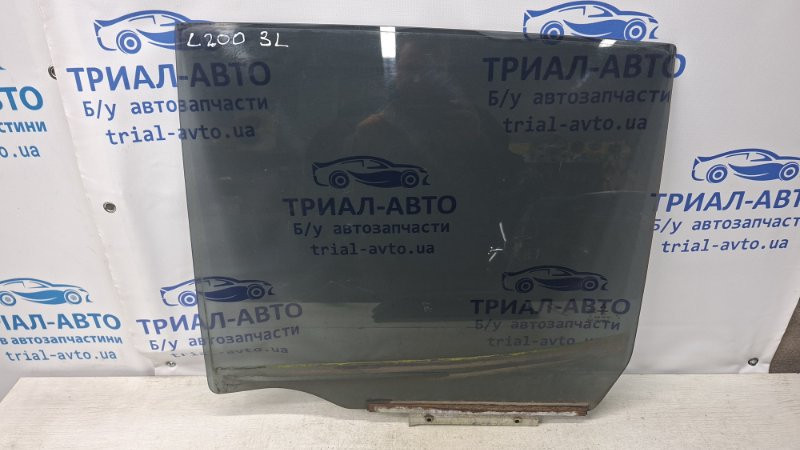 Стекло двери заднее левое Mitsubishi L200 KB 2.5 ДИЗЕЛЬ 4D56U 2006 (б/у) Киев - изображение 1