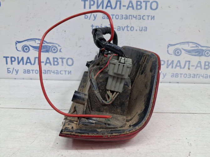 Фонарь задний внешний левый Nissan Navara D40 2.5 DIESEL YD25DDTI 2004 (б/у) Киев - изображение 6