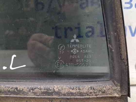 Стекло двери задней левой (форточка) Mitsubishi Pajero Sport 1996-2008 MR259917 (Арт. 64942) Киев