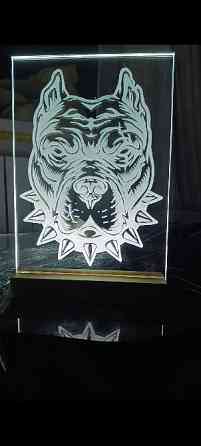 Портрети та картини вирізані на склі Киев