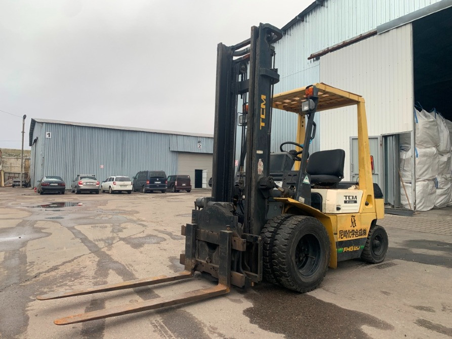 Вилковий автонавантажувач TCM з ротатором (система перевороту вил на 360 градусів). На спарці пневмо Днепр - изображение 1