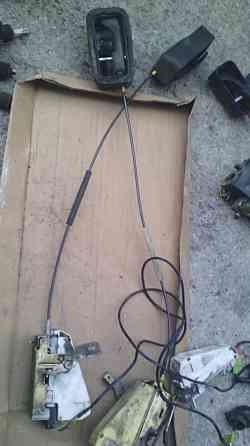 Трос открывания задних дверей 1053038 Форд ескорт оригинал Вінниця