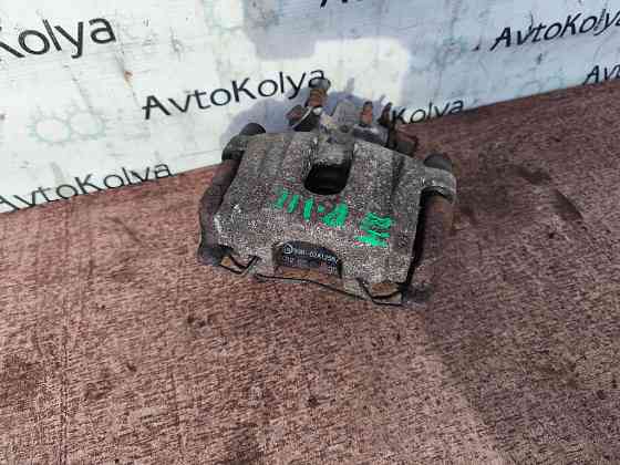 Суппорт задний правый Nissan Primera P12 2001-2007 Ковель