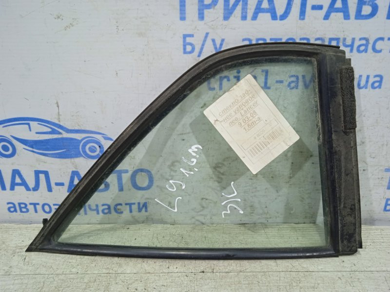Стекло двери задней левой (форточка) Mitsubishi Lancer 9 1.6 БЕНЗИН 4G18 2003 (б/у) Киев - изображение 1