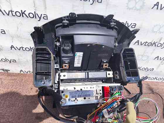 Автомагнитола + консоль бардачка Nissan Note E11 2005-2012 Ковель