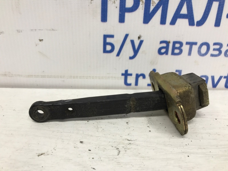 Ограничитель двери передний правый Mitsubishi Pajero Sport K9 2.5 DIESEL 4D56 1996 (б/у) Киев - изображение 1