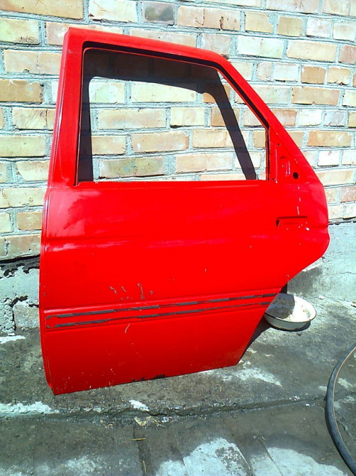 Дверка задня ліва 6871838 Форд Ескорт 91-95р.в. хетчбек,седан Вінниця - зображення 1