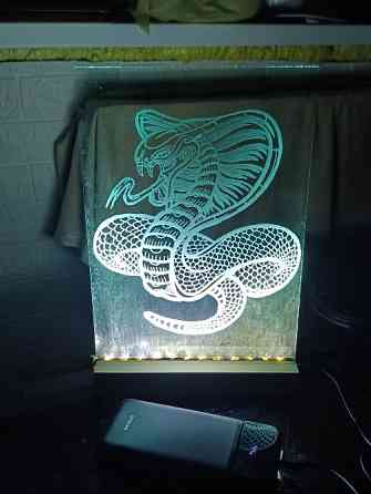 Портрети та картини вирізані на склі Киев