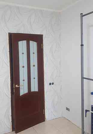 Поклейка шпалер обоев в Киеве Київ