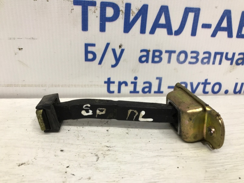 Ограничитель двери передний левый Mitsubishi Pajero Sport K9 2.5 DIESEL 4D56 1996 (б/у) Киев - изображение 1