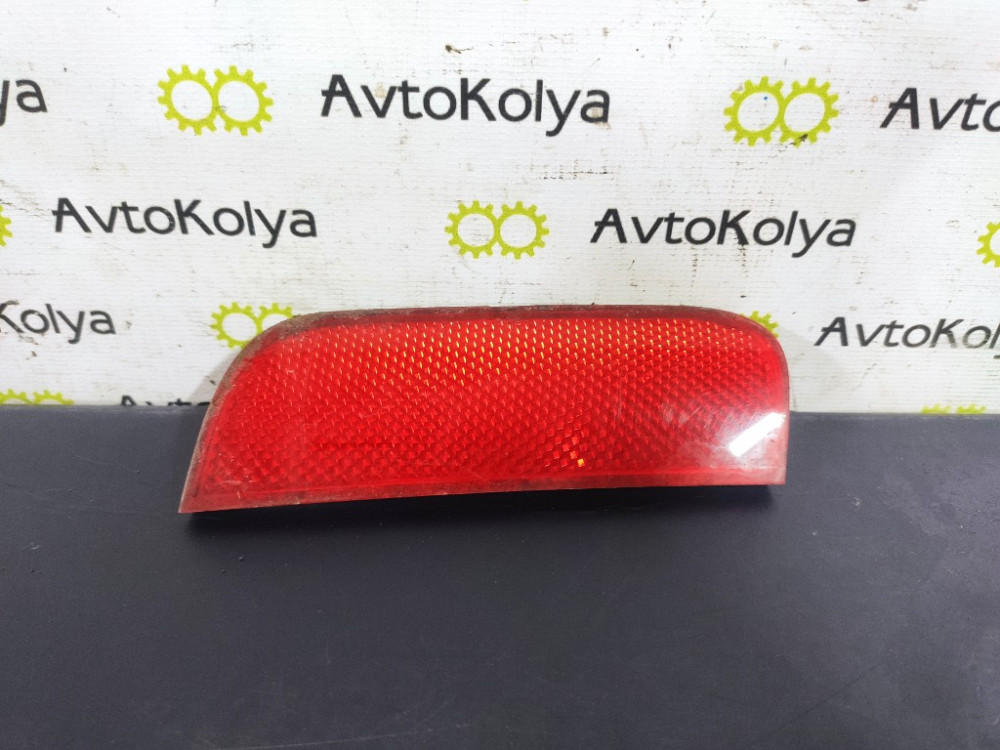 Катафот (светоотражатель) бампера задний левый Ford Fusion 2002-2006 (6N11-515C0-A) Ковель - зображення 1