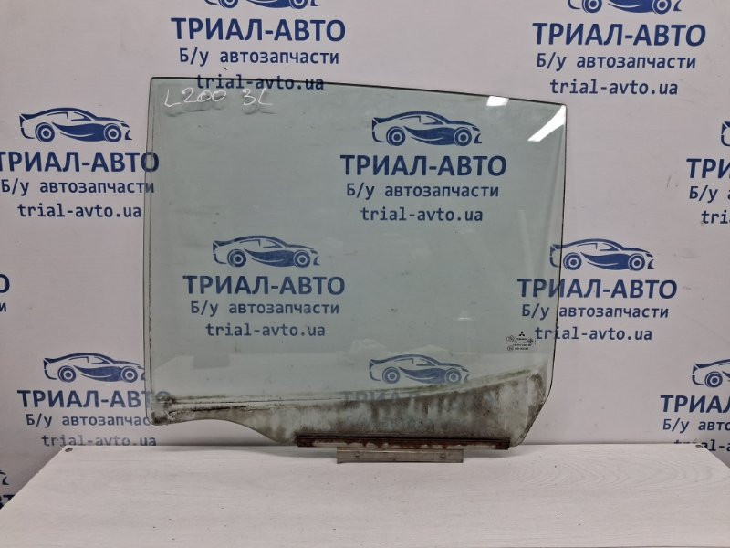 Стекло двери заднее левое Mitsubishi L200 KB 2.5 DIESEL 4D56 2006 (б/у) Киев - изображение 1