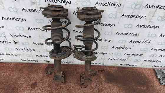 Амортизатор передний (стойка) Nissan Note E11 2005-2012 Ковель