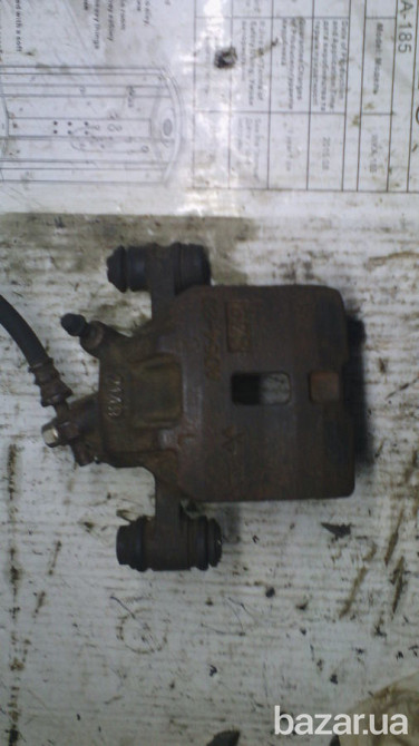 Суппорт передний левый Gj253371xa Mазда 626 86г. Ad54-20 оригинал Винница - изображение 1