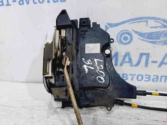 Замок двери задний левый Mitsubishi L200 KB 2.5 ДИЗЕЛЬ 4D56U 2006 (б/у) Київ