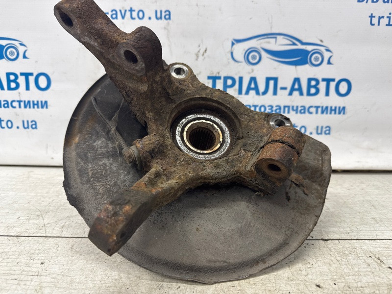 Кулак поворотный левый со ступицей Mitsubishi Outlander XL 2.4 БЕНЗИН 4B12 2007 (б/у) Киев - изображение 1