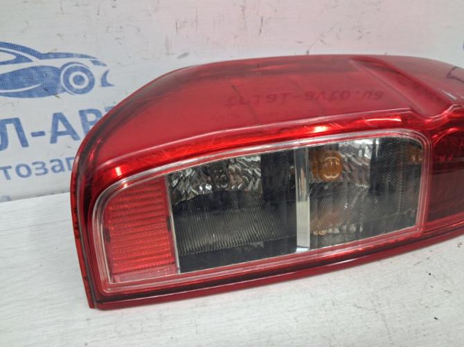 Фонарь задний внешний левый Nissan Navara D40 2.5 DIESEL YD25DDTI 2004 (б/у) Киев - изображение 2