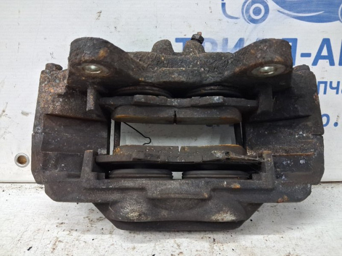 Суппорт передний левый Toyota Prado J120 4.0 1GR-FE 2002 (б/у) Киев - изображение 4