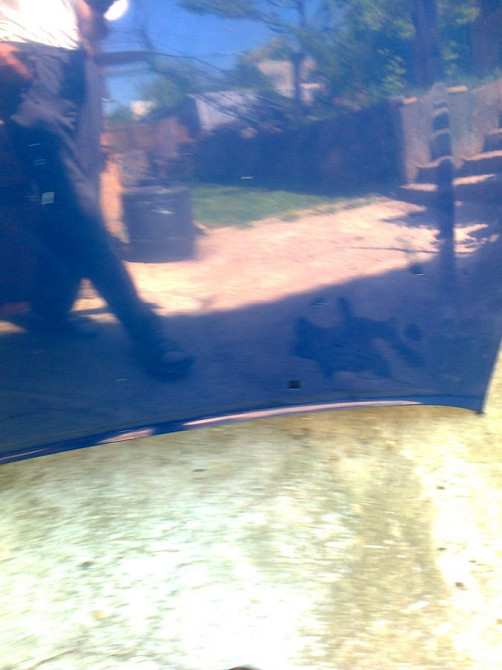 Капот з гратами 1661872 форд ескорт оріон 90-95г.в. оригінал Вінниця - зображення 1