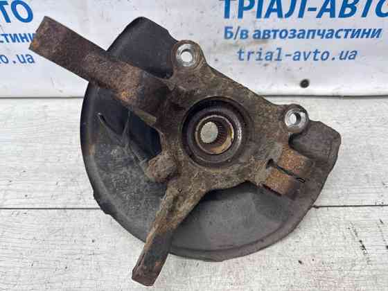 Кулак поворотный левый со ступицей Mitsubishi Outlander XL 2.4 БЕНЗИН 4B12 2007 (б/у) Киев