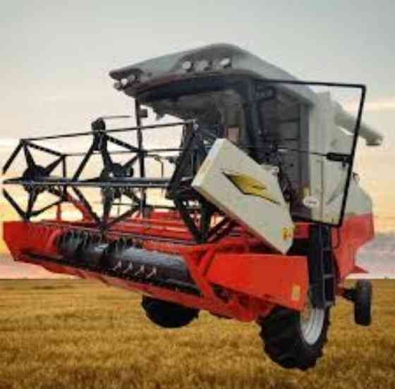 Готовая к работе спецтехника трактор, экскаватор, комбайн Дніпро