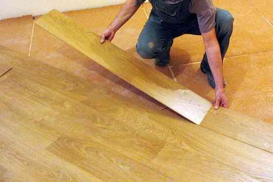 Укладання ламінату лінолеуму Київ Киев