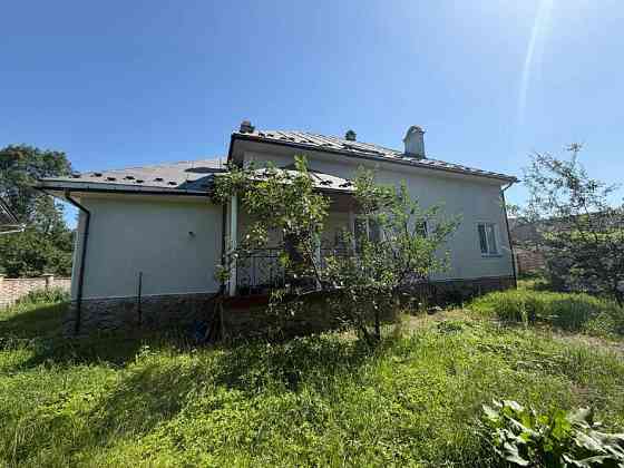 Просторий цегляний будинок 300 м² на 15 сотках з каміном, гаражем та зоною відпочинку Ивано-Франковск