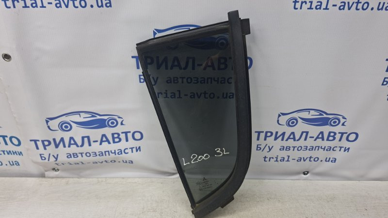 Стекло двери задней левой (форточка) Mitsubishi L200 KB 2.5 ДИЗЕЛЬ 4D56U 2006 (б/у) Киев - изображение 1