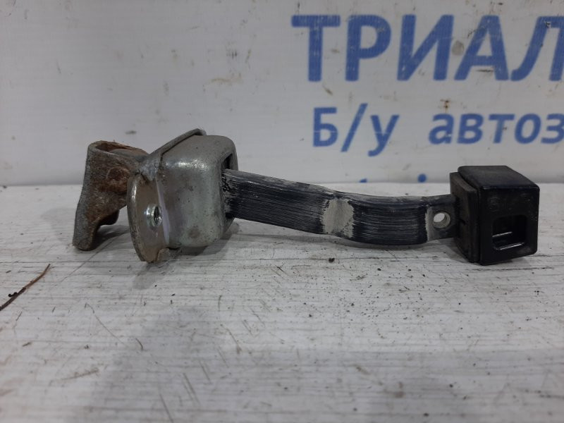 Ограничитель двери задний левый Mitsubishi L200 KB 2.5 ДИЗЕЛЬ 4D56U 2006 (б/у) Київ - зображення 1