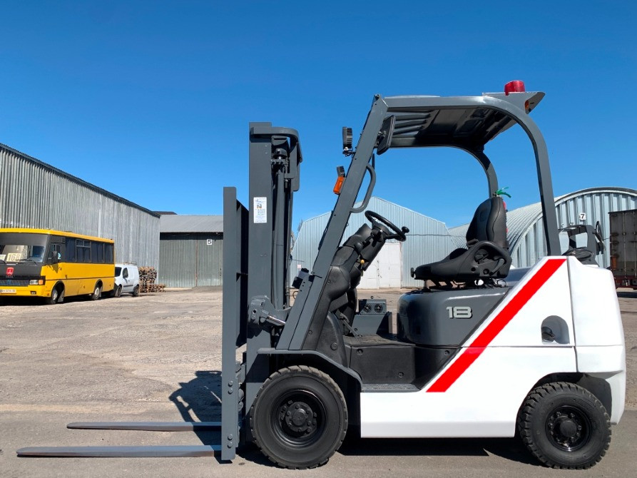 Вилочный автопогрузчик TCM (Nissan), с полукабиной, печью и позиционером вил. Модель: FGE18T5. Ужгород - изображение 1