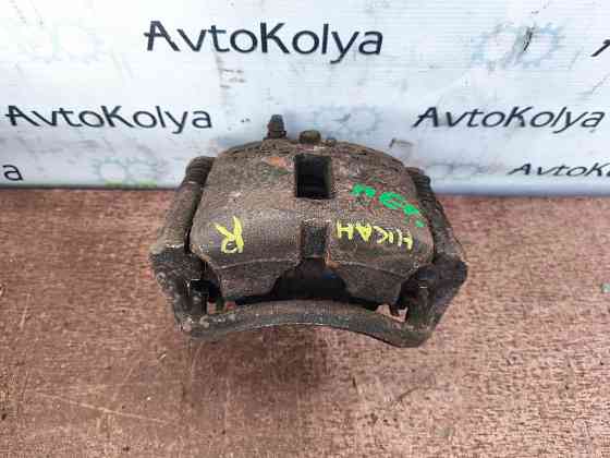 Суппорт передний правый Nissan Primera P12 2001-2007 Ковель