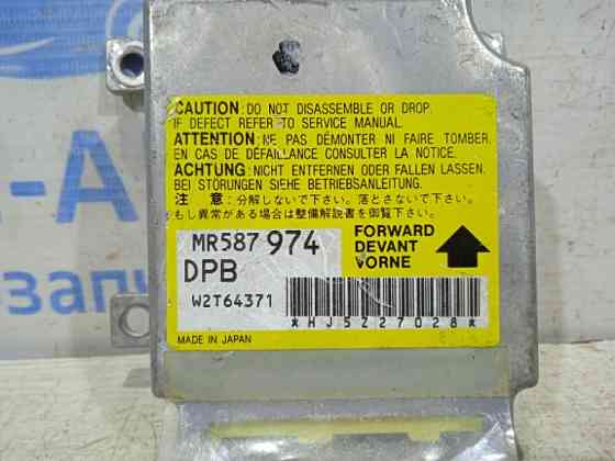 Блок управления AIRBAG Mitsubishi L200 KB 2.5 ДИЗЕЛЬ 4D56U 2006 (б/у) Киев