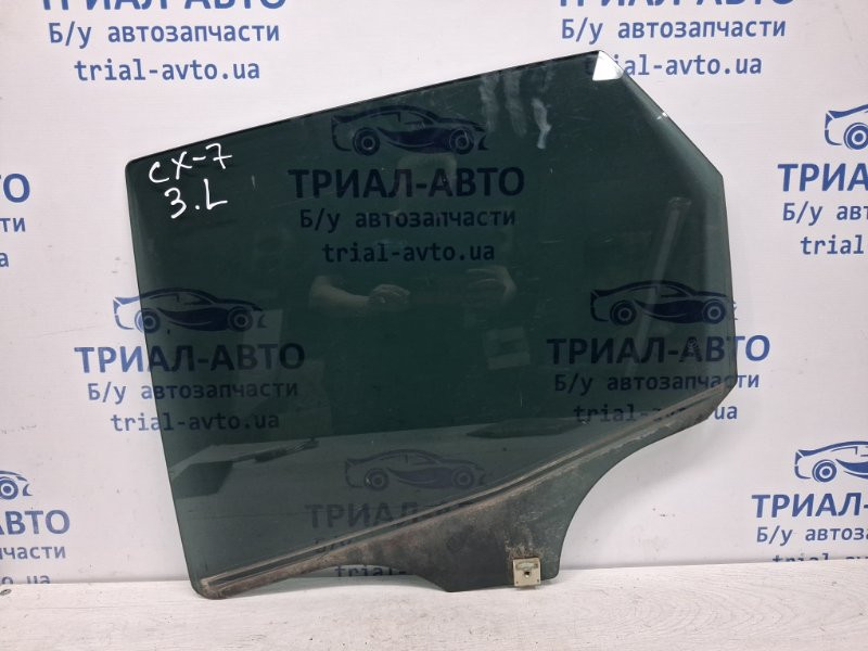 Стекло двери заднее левое Mazda CX 7 ER 2.3 БЕНЗИН 	L3VDT 2006 (б/у) Київ - зображення 1