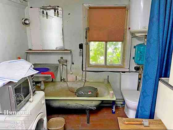 Півбудинку на Шевченка біля річки.Усі комунікації.5 соток. Біла Церква