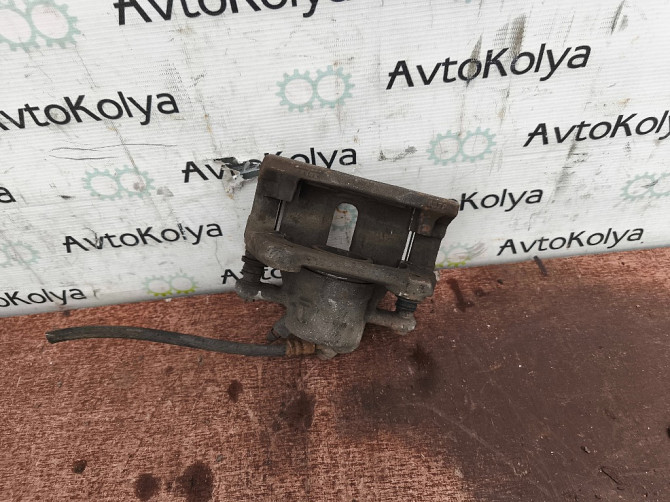 Суппорт передний Nissan Note E11 2005-2012 Ковель - зображення 7