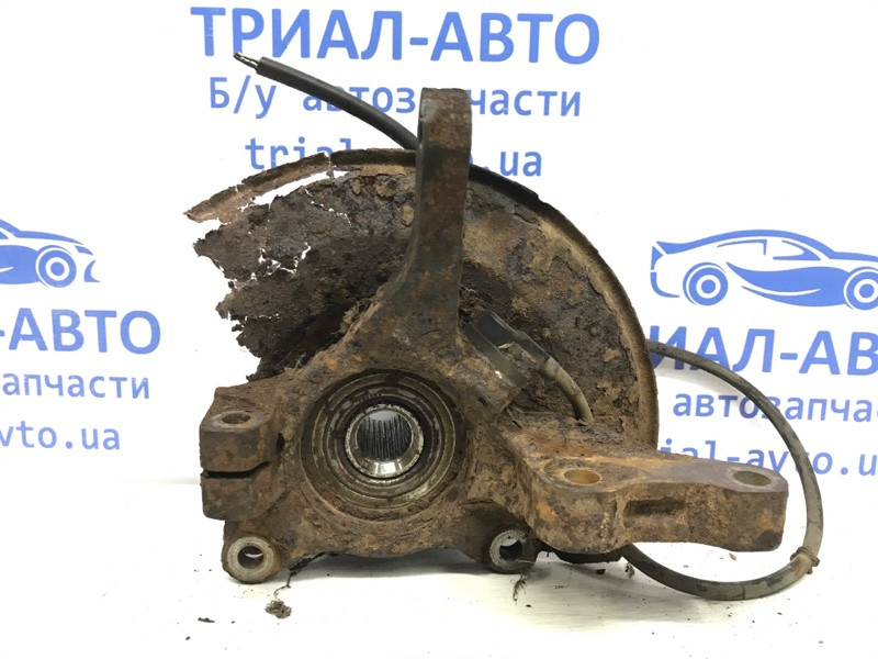 Кулак поворотный левый со ступицей Mitsubishi Outlander CU 2.4 БЕНЗИН 4G69 2003 (б/у) Киев - изображение 1