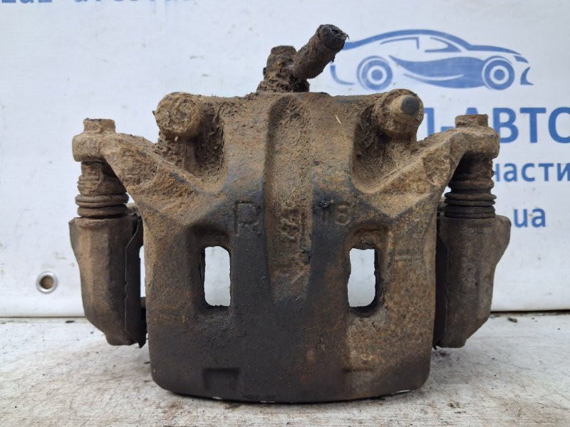 Суппорт передний правый Nissan Navara D40 2.5 DIESEL YD25DDTI 2004 (б/у) Киев - изображение 1