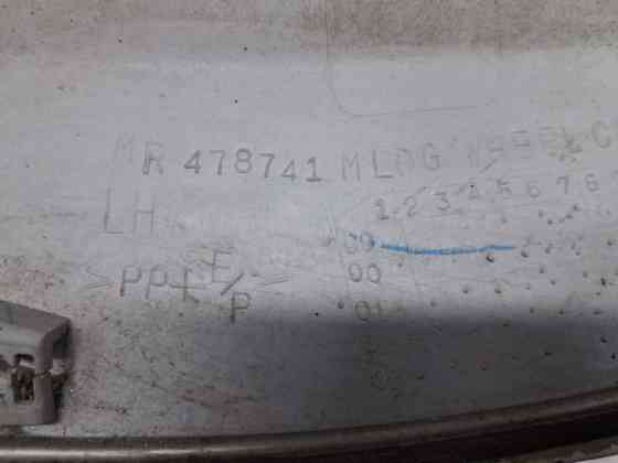 Накладка крыла Mitsubishi Pajero Wagon 3 3.2 ДИЗЕЛЬ 4M41 1999 перед. лев. (б/у) Киев