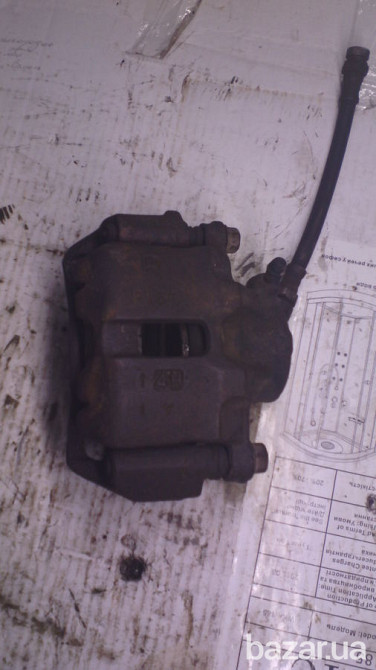 Супорт передній правий F16g Міцубісі Ланцер 92г.в. Mb699471 оригінал Вінниця - зображення 1