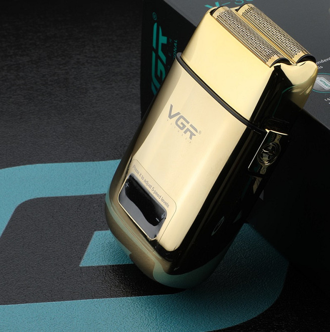 Электробритва VGR V-338 GOLD золотистая Київ - зображення 4