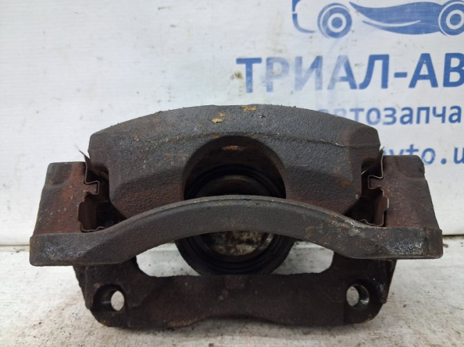 Суппорт передний левый Nissan Qashqai J10 2.0 БЕНЗИН MR20DE 2006 (б/у) Киев - изображение 2