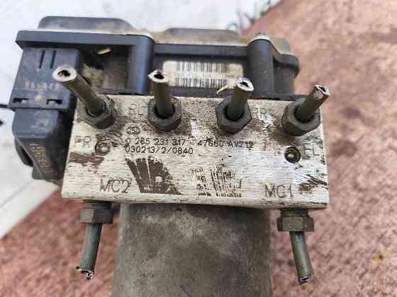 Блок ABS Nissan Primera P12 2001-2007 (0265231317) Ковель