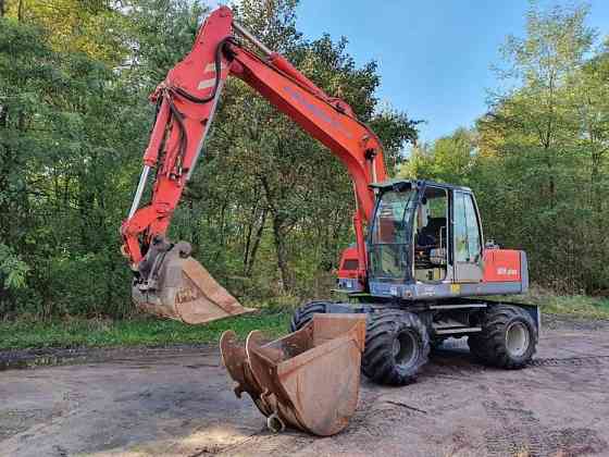 Оренда/послуги екскаватора O&K MH Plus екскаватор колісний спецтехніка Червоноград