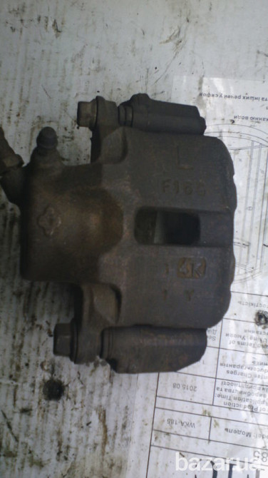 Супорт передній лівий F16g Міцубісі Ланцер 92р.в. Mb699470 оригінал Вінниця - зображення 1