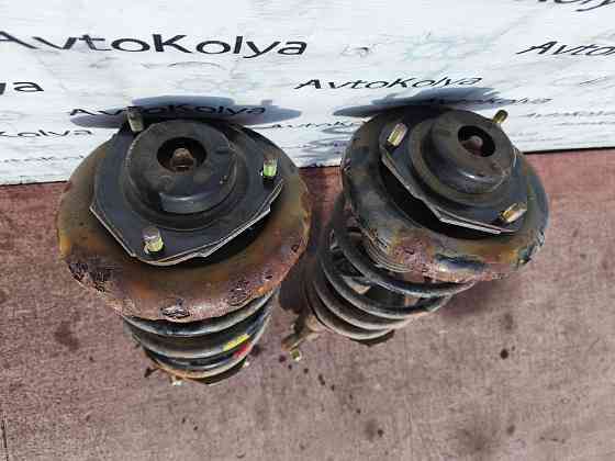 Амортизатор передний (стойка) Nissan Primera P12 2001-2007 Ковель