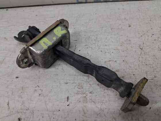 Ограничитель двери передний правый Nissan Note 2005-2013 804301U600 (Арт. 84577) Київ