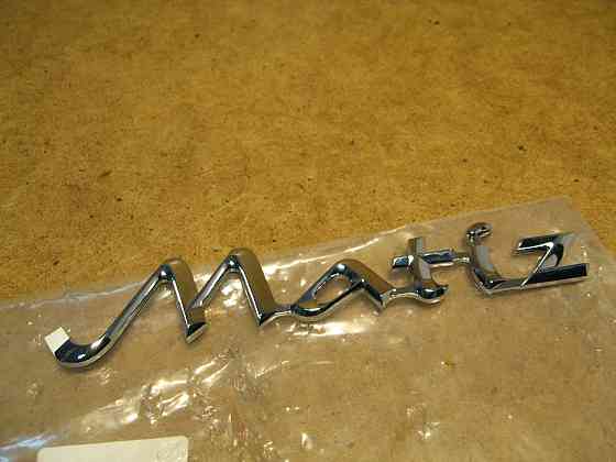 Эмблема крышки багажника Matiz Дніпро